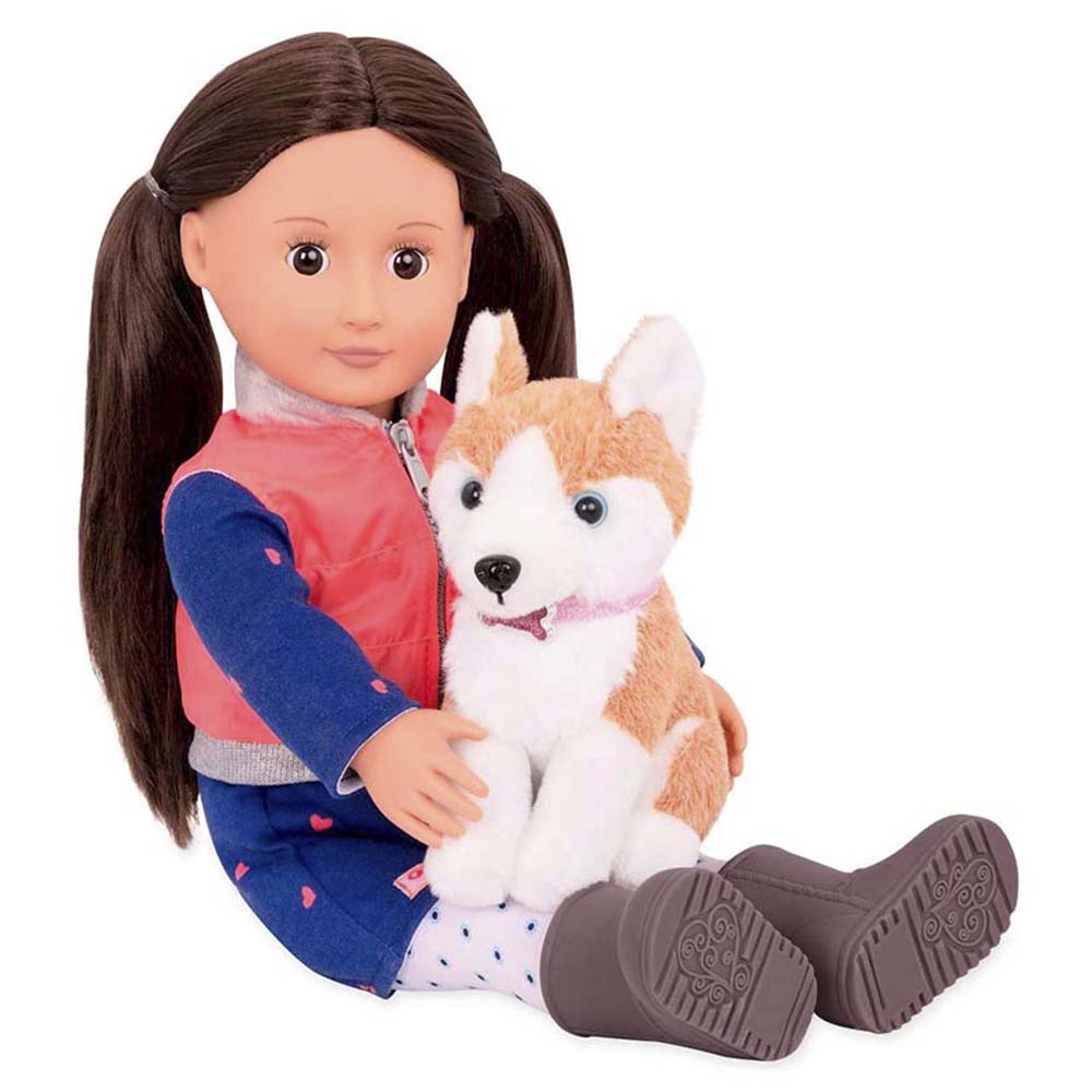 Leslie con su mascota Husky, muñeca de Our Generation